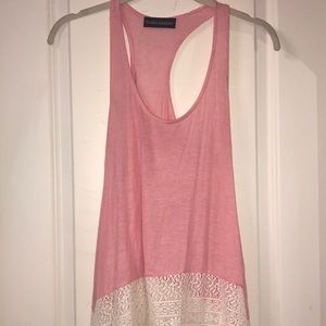 Pink racerback tank with lace around bottom